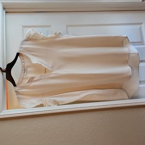 White sleeveless blouse